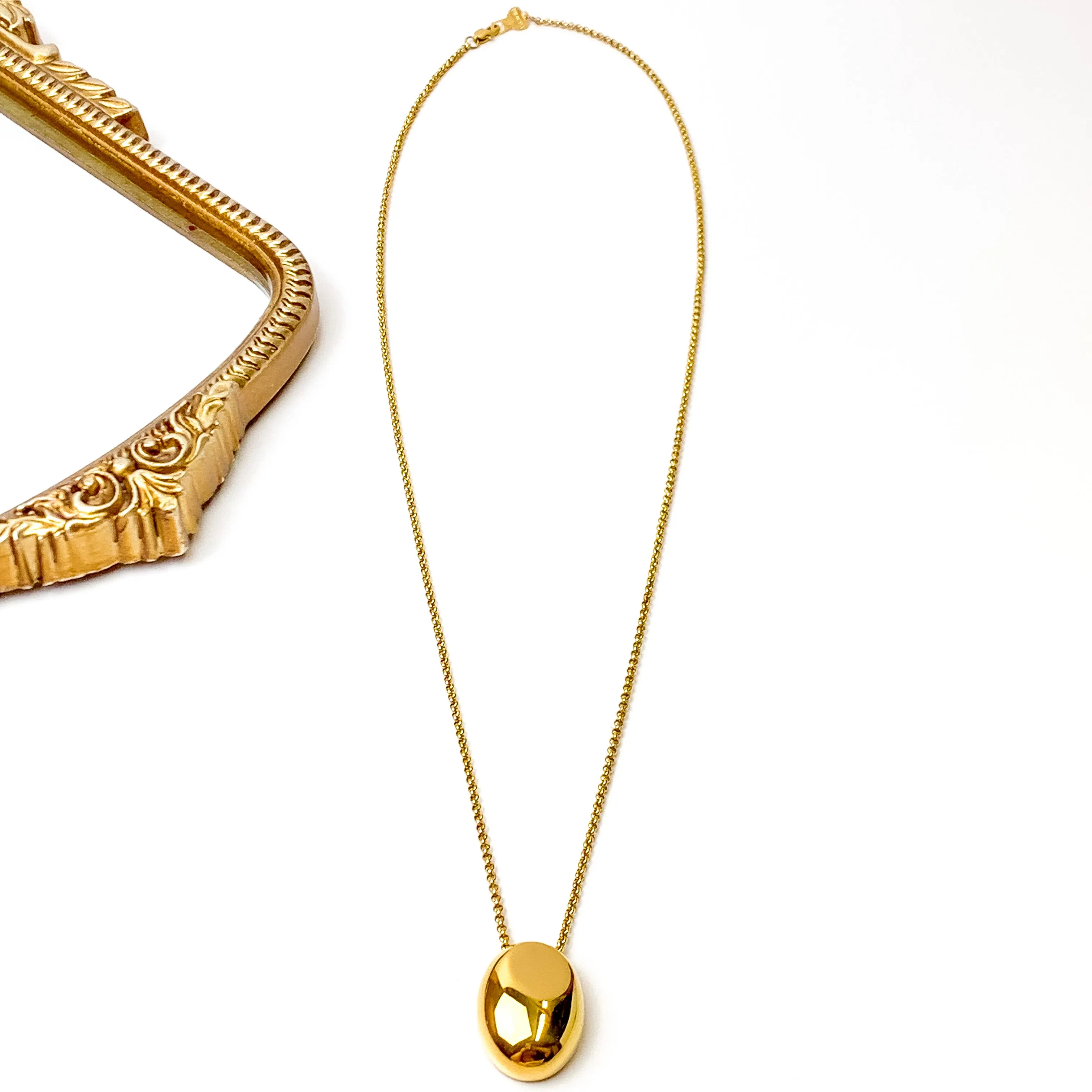 Bracha | La Dome Long Gold Tone Necklace with Oval Domed Pendant