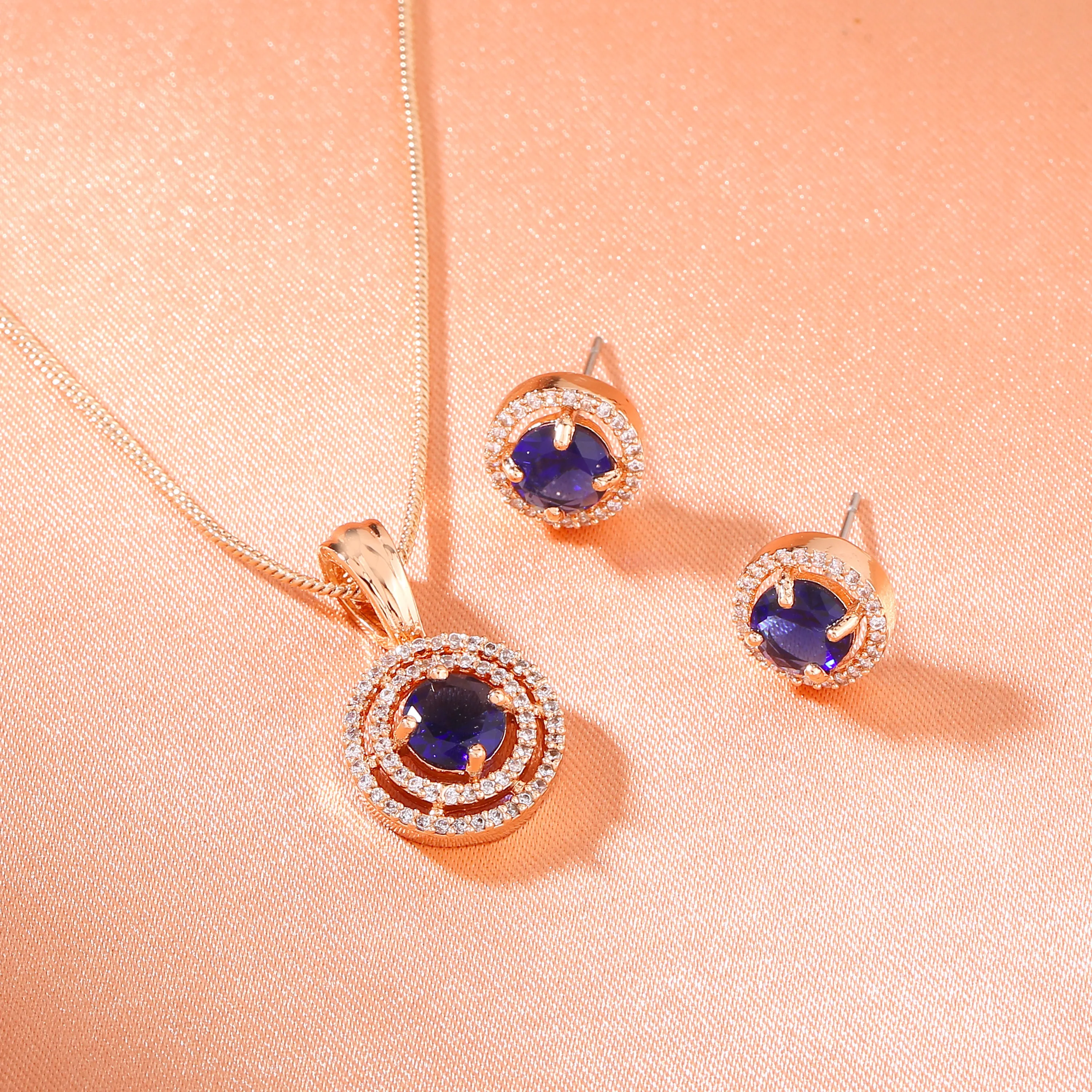 Estele Rose Gold Plated CZ Circular Pendant Set with Blue Stones for Women