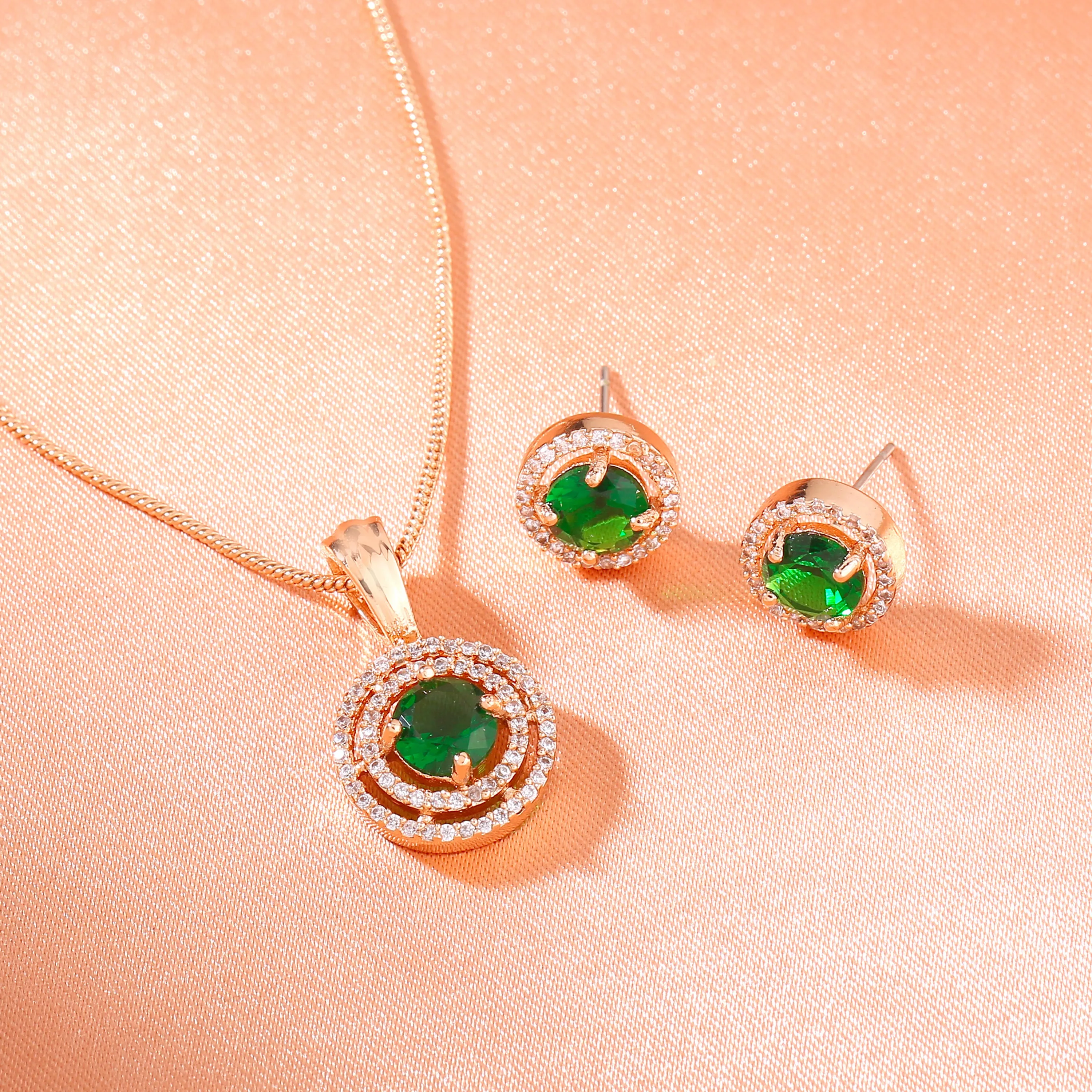 Estele Rosegold Plated CZ Circular Designer Pendant Set with Green Stones for Women