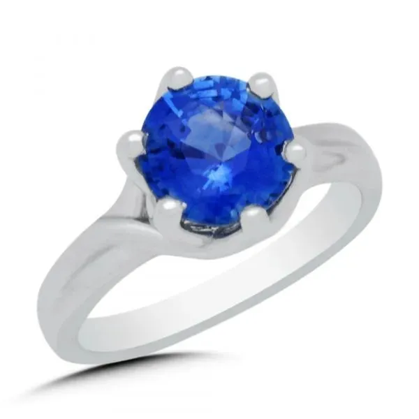 Round blue sapphire engagement ring and wedding band